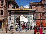 Kathmandu Boudhanath 03 Boudhanath Entrance The magnificent Boudhanath Stupa near Kathmandu is approached on the south side of the stupa under an arched gateway, a new addition built in traditional Tibetan monastic design with eight auspicious symbols on two sides of the gate and some miniature chaityas on the top.